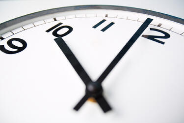 bigstock-Macro-shot-of-a-clock-face-sho-48754406